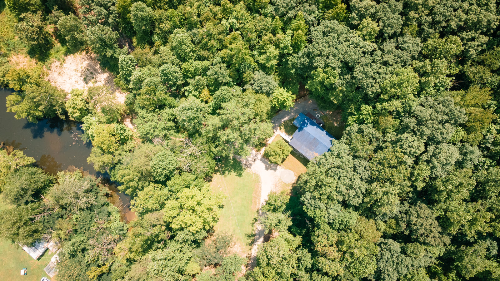 Aerial drone shot — riverside property